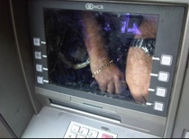 Thanks Reddit juggled the ATM and found a false screen with a man inside trying to write down debit cards